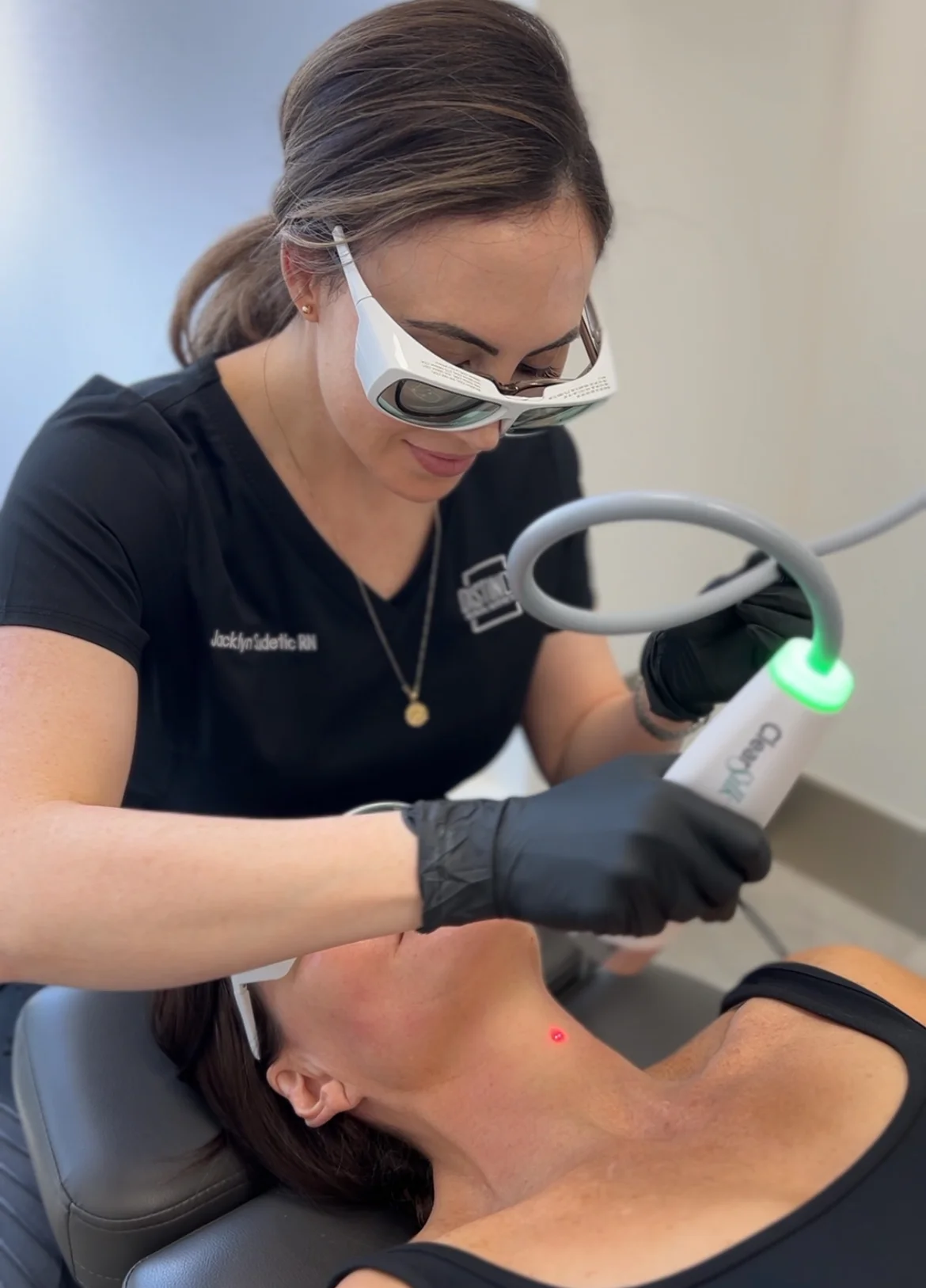 Nurse Jacklyn Sudetic, RN, performs a ClearSilk laser facial on a patient at Distinct Medical Aesthetics in Oakville